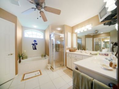 Spacious Bathroom with Walk in Shower and Tub